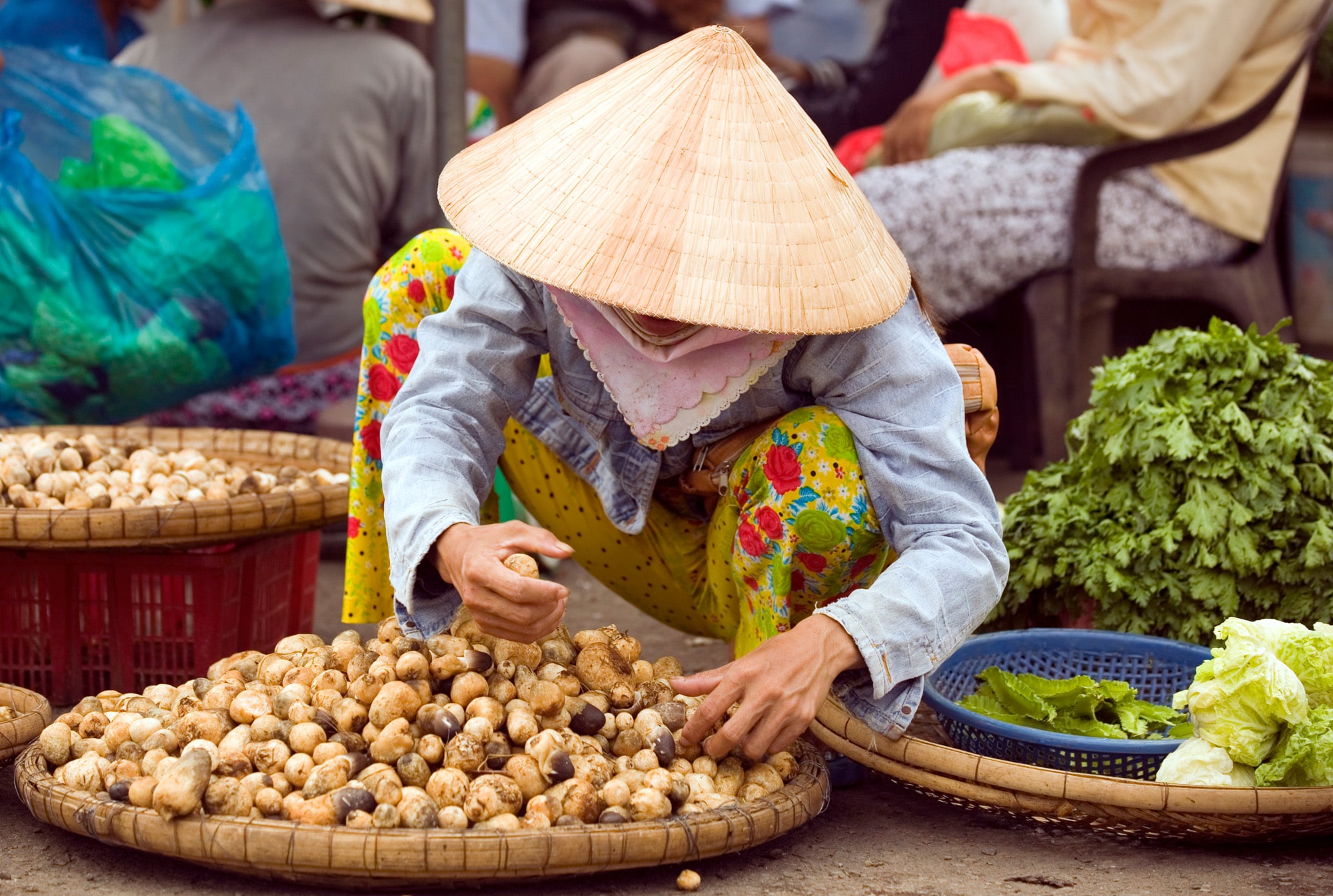 vietnam street market lady seller ho chi minh saigon